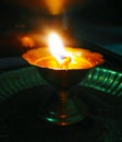 A holy lamp lit during workship Royalty Free Stock Photo