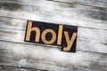 Holy Letterpress Word on Wooden Background Royalty Free Stock Photo