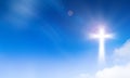 Holy light of crucifix cross on blue sky background. Hope and freedom concept Royalty Free Stock Photo