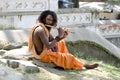 Holy man with flute Royalty Free Stock Photo