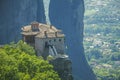 The Holy Monastery of Roussanou sit precipitously on mountain boulder in Meteora, At Thesally, Greece. Royalty Free Stock Photo