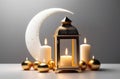 holy month of Ramadan, Laylat al-Qadr, Arab lantern fanus, golden candles, light shades, gray background Royalty Free Stock Photo