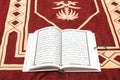 Holy Muslim Quran and special mat for prayer and namaz. Concept of the religion of Islam