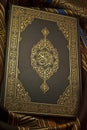 Intricate Beauty: The Holy Quran on Arabic Art Cloth Royalty Free Stock Photo