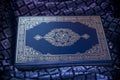 Quran under Moonlit Hue Royalty Free Stock Photo