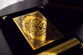 Holy Quran book cover. black and gold design. arabic calligraphy. islamic symbol Royalty Free Stock Photo