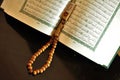 The holy Quran with tasbih/rosary beads