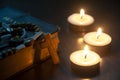 Holy Rosary, Bible and burning candles with customizable space for religious text or ideas. Copy space and religion Royalty Free Stock Photo