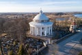 Holy Trinity Church in Suderve, Vilnius district, Lithuania. Cemetery in foreground. Drone Royalty Free Stock Photo