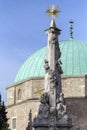 Holy Trinity statue with the mosque of pasha Qasim the Victorious in Pecs