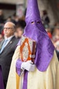 Holy Week in Malaga, Spain. Nazarene with ornated box in Palm Sunday procession.