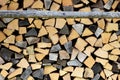 Logs in front of a wall Royalty Free Stock Photo