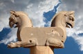 Homa the Griffin Capital Statuary in Persepolis of Shiraz in Iran Against Blue Sky with White Fluffy Clouds