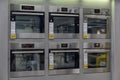 Home appliance store, row of ovens Royalty Free Stock Photo