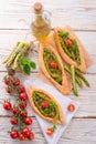 Home-baked pide with green asparagi Royalty Free Stock Photo