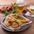 Home-baked pide with green asparagi Royalty Free Stock Photo