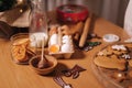 Home bakery, cooking traditional festive sweets. Preparing for making gingerbread dough on wooden table. New Year Royalty Free Stock Photo