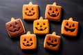 Home baking Halloween cookies for party, cute and delicious homemade iced biscuits on dark background, top view. Generative AI Royalty Free Stock Photo