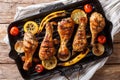 Home barbecue grilled chicken drumstick legs with vegetables in Royalty Free Stock Photo