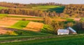 Home and barn on the farm fields and rolling hills of Southern York County, PA Royalty Free Stock Photo