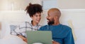 Home, bed and black couple with a laptop, love or smile with website for comedy, internet or streaming a movie. Bedroom Royalty Free Stock Photo