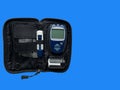 Home blood glucose meter. Glucometer, a test strip in the package,piercing device.