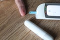 Blood sugar testing machine in the home for diabetes Royalty Free Stock Photo