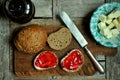 Home breakfast with blueberry jam, butter and bread Royalty Free Stock Photo