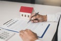 Home buyers are checking into the contract. Royalty Free Stock Photo