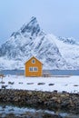 Home, cabin or house, Norwegian fishing village in Reine City, Lofoten islands, Nordland county, Norway, Europe. White snowy