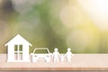 Home car family on wood table. concept assurance health-care Royalty Free Stock Photo