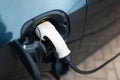 Home charging station for EV car. Top view of plug-in Royalty Free Stock Photo