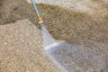 Pressure washing concrete driveway Royalty Free Stock Photo