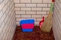 Home cleaning supplies: Broom, dustpan, bucket and rag. Room cleaning