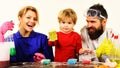 Home cleaning time. Mother father and son with cleaning supplies. Family cleans together with Cleaning spray. Royalty Free Stock Photo