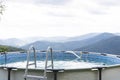 Home collapsible pool. A small rubber swimming pool within the country villa in the mountains