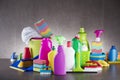 Variety cleaning products on gray background. Royalty Free Stock Photo