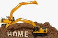 Home concept and Two excavators . Royalty Free Stock Photo