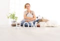 Home concepts, young woman hugging a big comfortable cushions, s