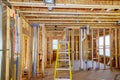 Home construction with hot and cold blue and red pex pipe layout in pipes and exposed beams Royalty Free Stock Photo