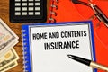 Home and contents insurance. Text inscription on the contract form. Royalty Free Stock Photo