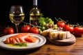 home cook garnishing smoked salmon bruschetta with olive oil Royalty Free Stock Photo