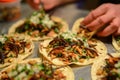 home cook plating wax moth larvae tacos