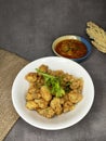 home cooking calamari crispy squid sweet and sour sauce for dinner Royalty Free Stock Photo