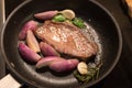 Home Cooking: grilled Steak with onions and herbes Royalty Free Stock Photo