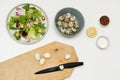 Home cooking, making diet homemade vegetable vegetarian caesar salad,meal, step instruction.cutting quail eggs, adding them to the