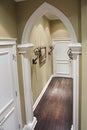 Home corridor with decorative metal details.