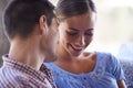 Home, couple and conversation on couch for love, marriage and romance or care in living room. Happy people, talking and Royalty Free Stock Photo