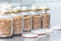 Series of jars with sterile grains for growing edible mushrooms at home