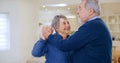 Home, dancing and senior couple with love, celebration and retirement with romance in a living room. Romantic, elderly Royalty Free Stock Photo